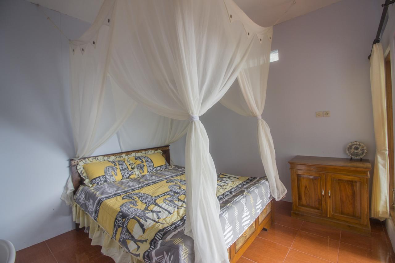 Gangga Homestay Мундук Екстер'єр фото